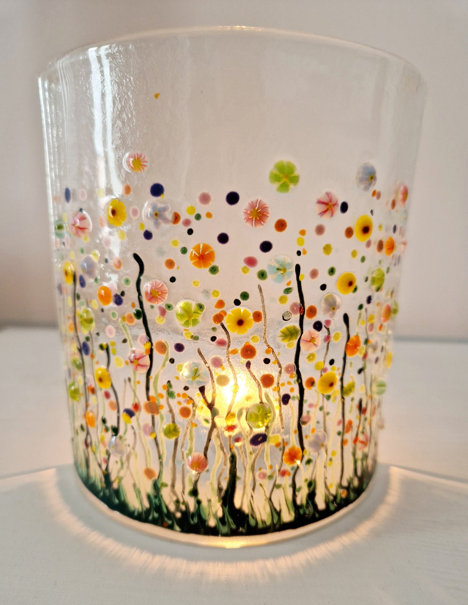 Hand crafted fused glass decorative ornamental display in yellow and orange ditsy flower design