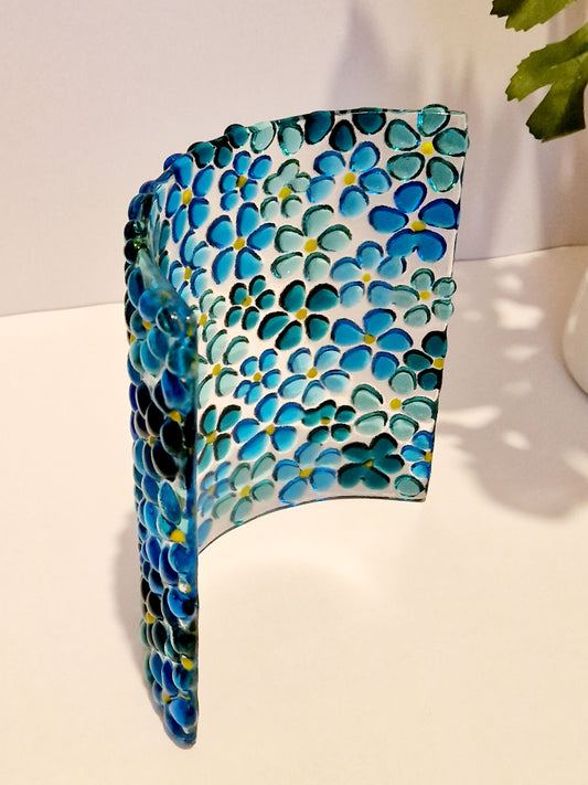 Fused glass suncatcher display in ditsy blue flower design