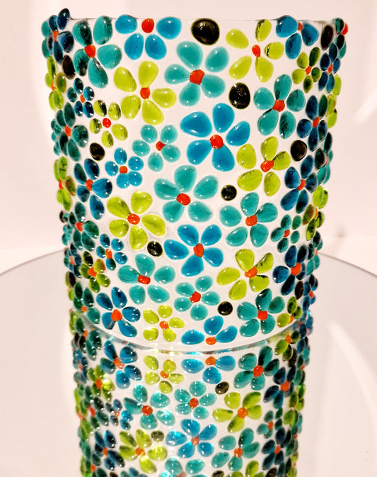 Green fused glass curve display in ditsy flower design on mirror