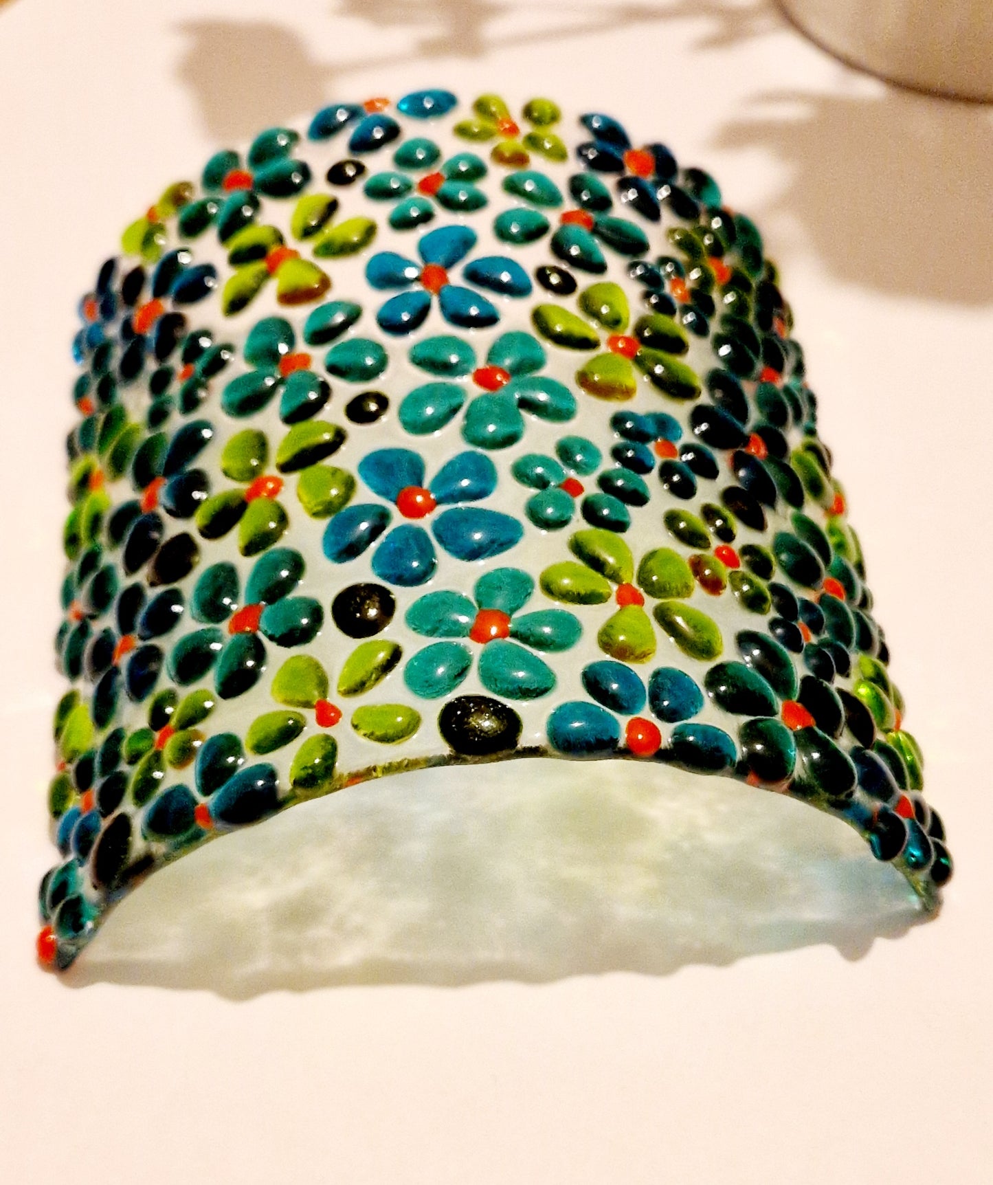 Fused glass suncatcher display in ditsy green flower design