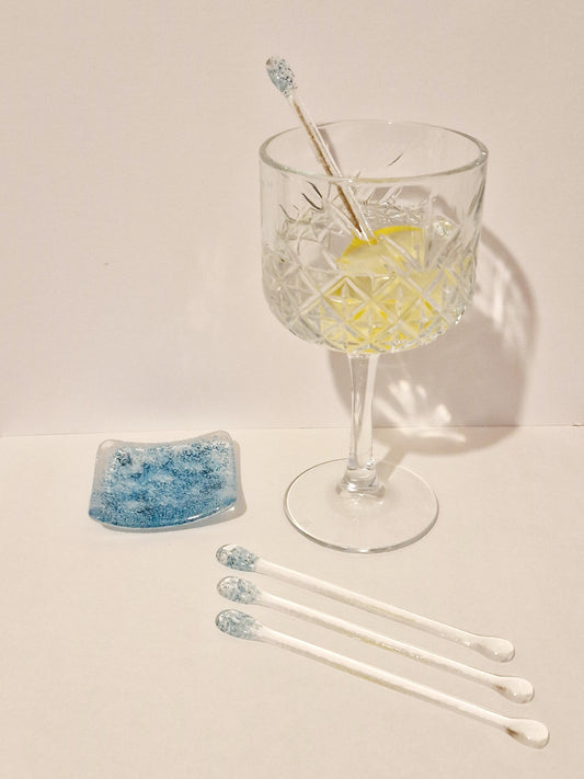 Fused glass Bubble drink stirrers displayed in glass
