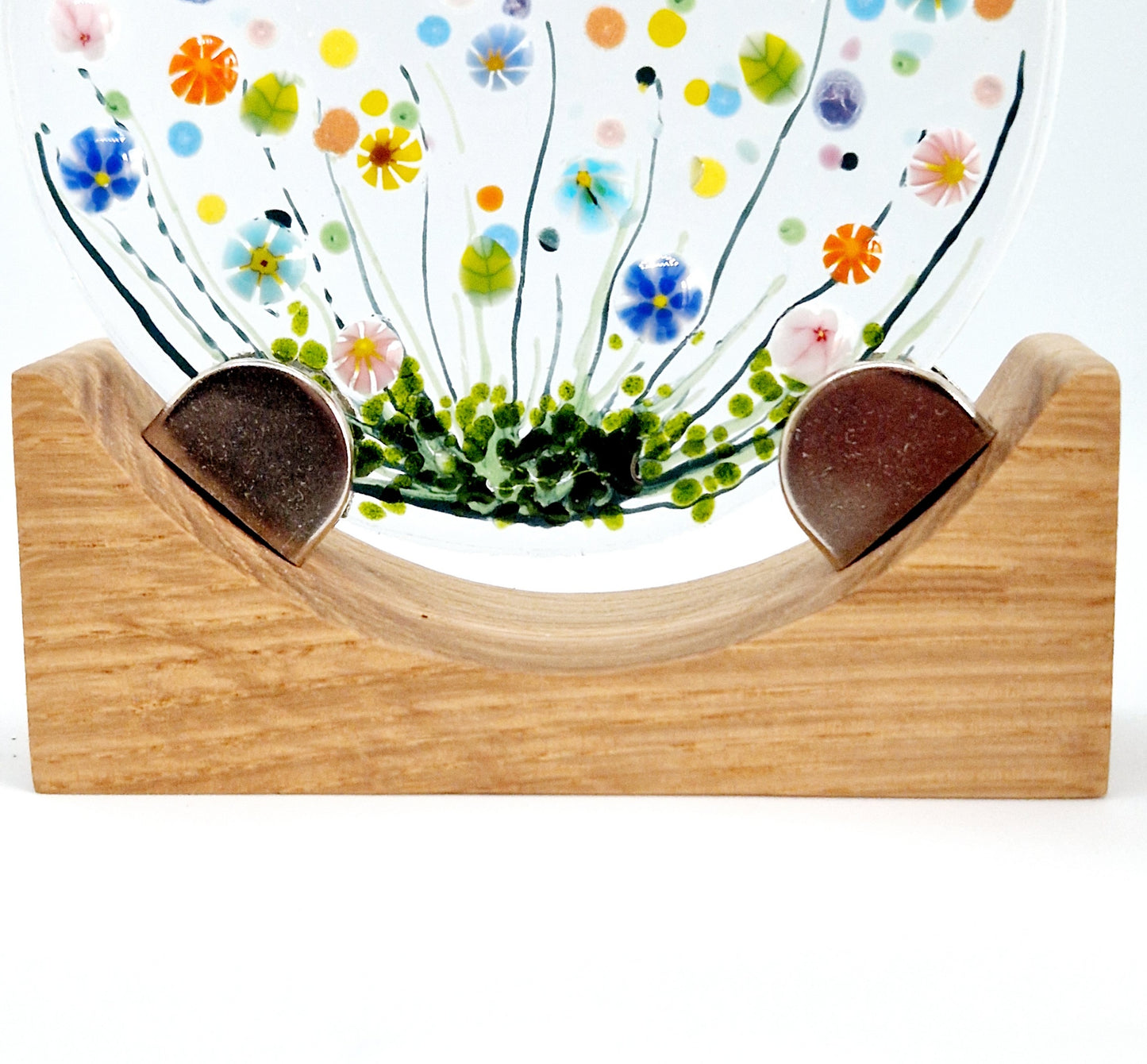 Small round meadow display on oak stand