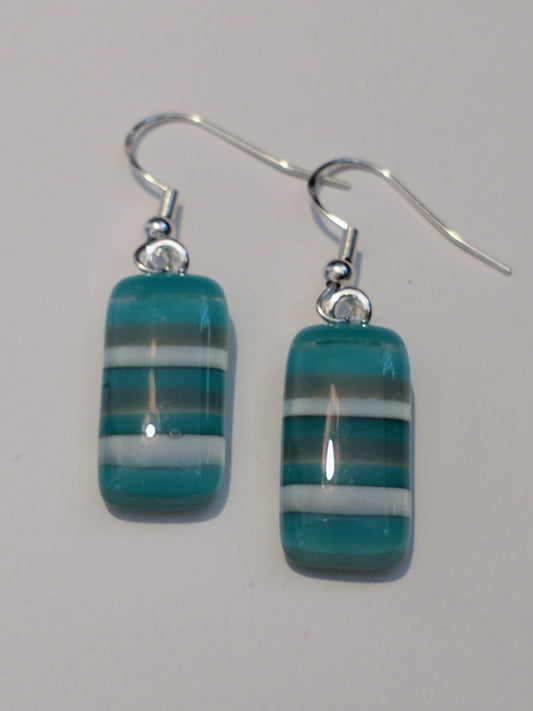Fused glass pale blue striped drop earrings on a silver plated hook